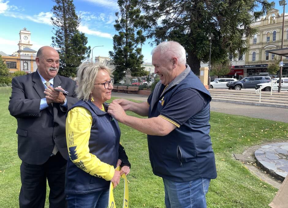 Goulburn Rotary president, Steve Ruddell, presented the council's road safety officer, Tracey Norberg with a Paul Harris Fellowship at Wednesday's launch. Picture by Louise Thrower.