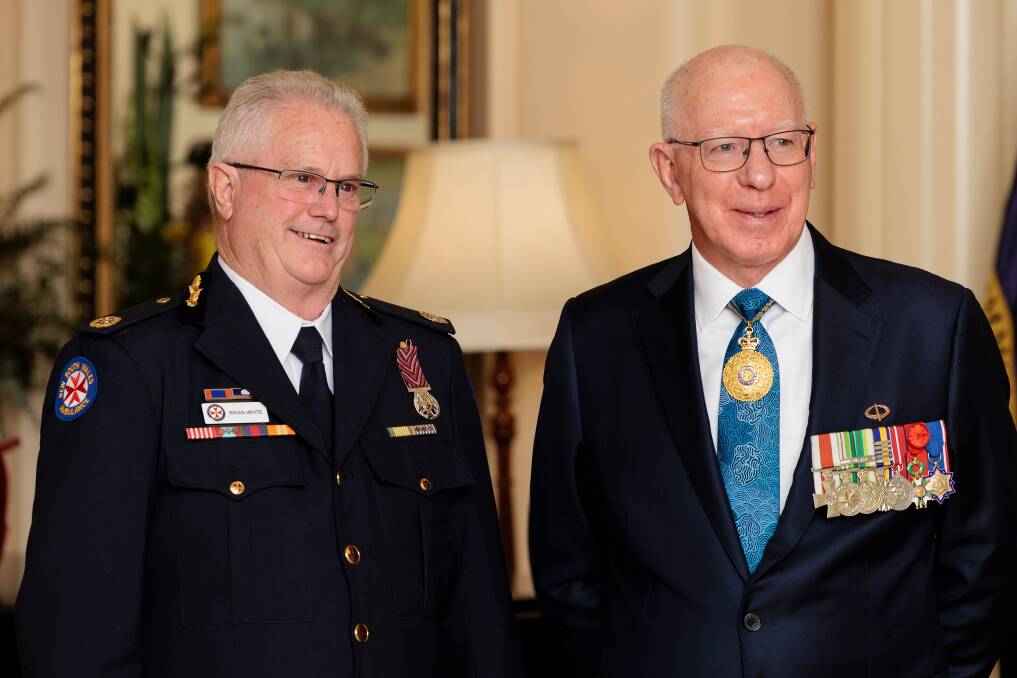Governor General David Hurley AC, DSC, FTSE (right) presented Goulburn's Brian White with an Ambulance Service Medal at Government House on Friday. Picture by Government House.