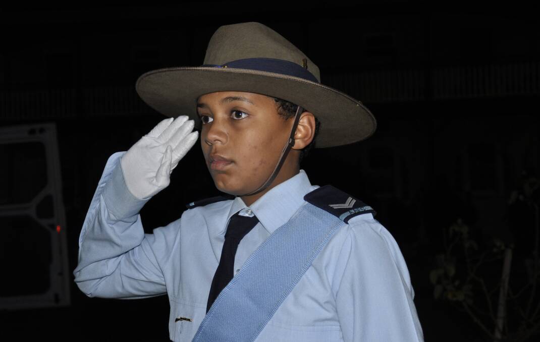 Goulburn RAAF cadet from Squadron 325, Lerato Mikhiza pays his respects at the city's Anzac Day dawn service. Picture by Louise Thrower.