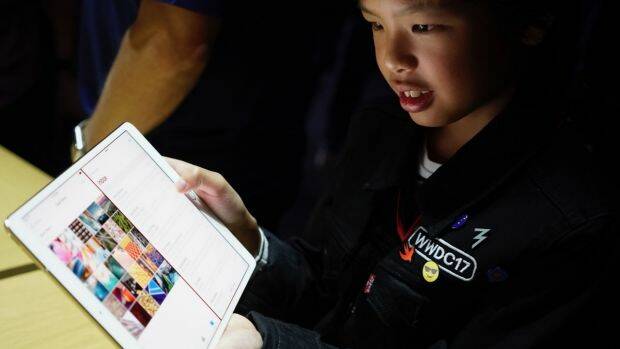 10-year-old Australian app developer Yuma Soerianto uses the new iPad Pro. Photo: Peter Wells
