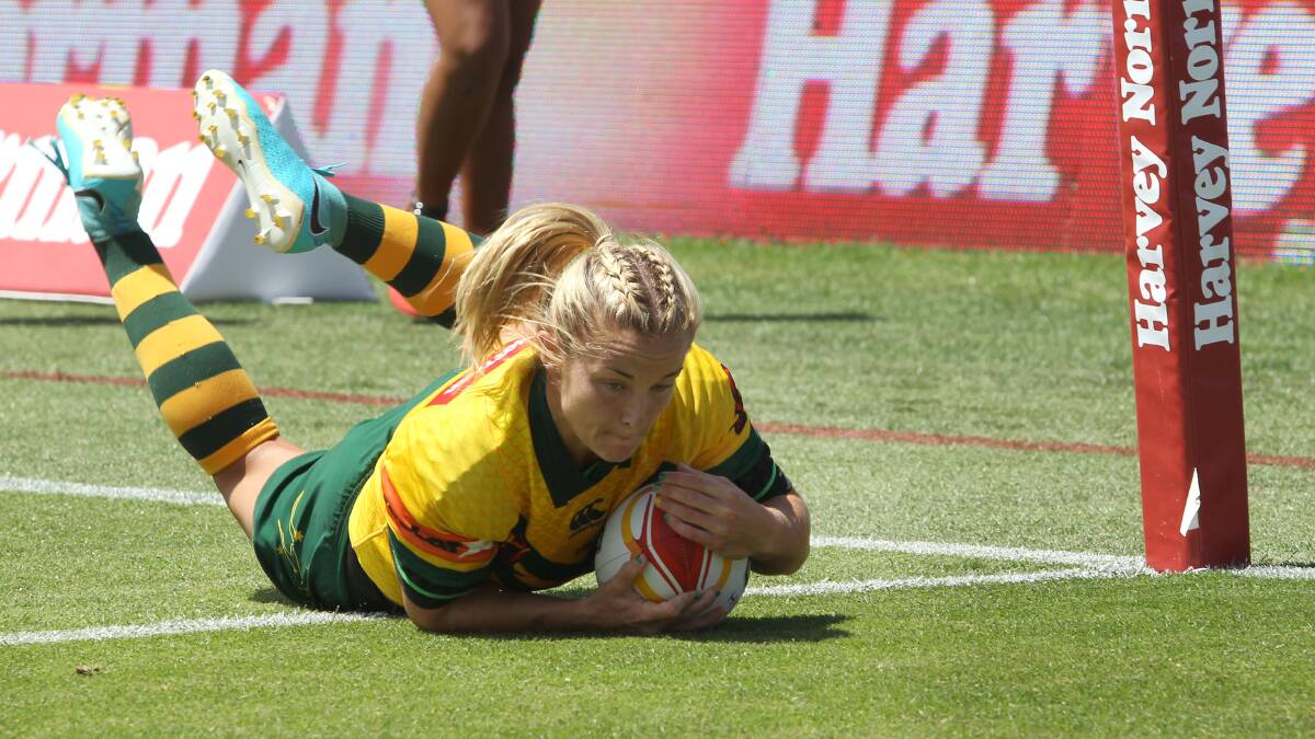 Highlights of the Women's Rugby League World Cup match between Australia and England at Southern Cross Group Stadium in Sydney. Photos: John Veage and Craig Golding/AAP