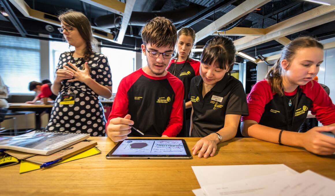 BRIGHT MINDS: Xander Radoll (centre) participating in the National Questacon Invention Convention with other young innovators. Photo: Questacon
