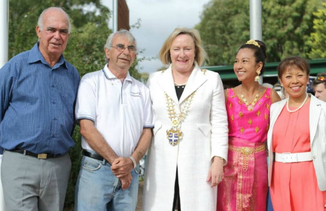 Engagement: Recent migrants most likely take part in Australia Day events. Pictured: Yass Valley mayor Rowena Abbey (centre) and citizens in 2016. Photo: RS Williams