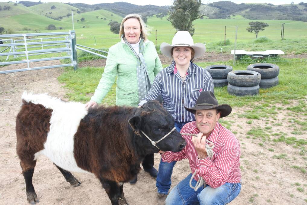 Uniquely Aussie: Bert Barass with his new breed, daughter Montana and Yass Valley mayor Rowena Abbey, all excited about what it means for the industry. Photo: Jessica Cole. 