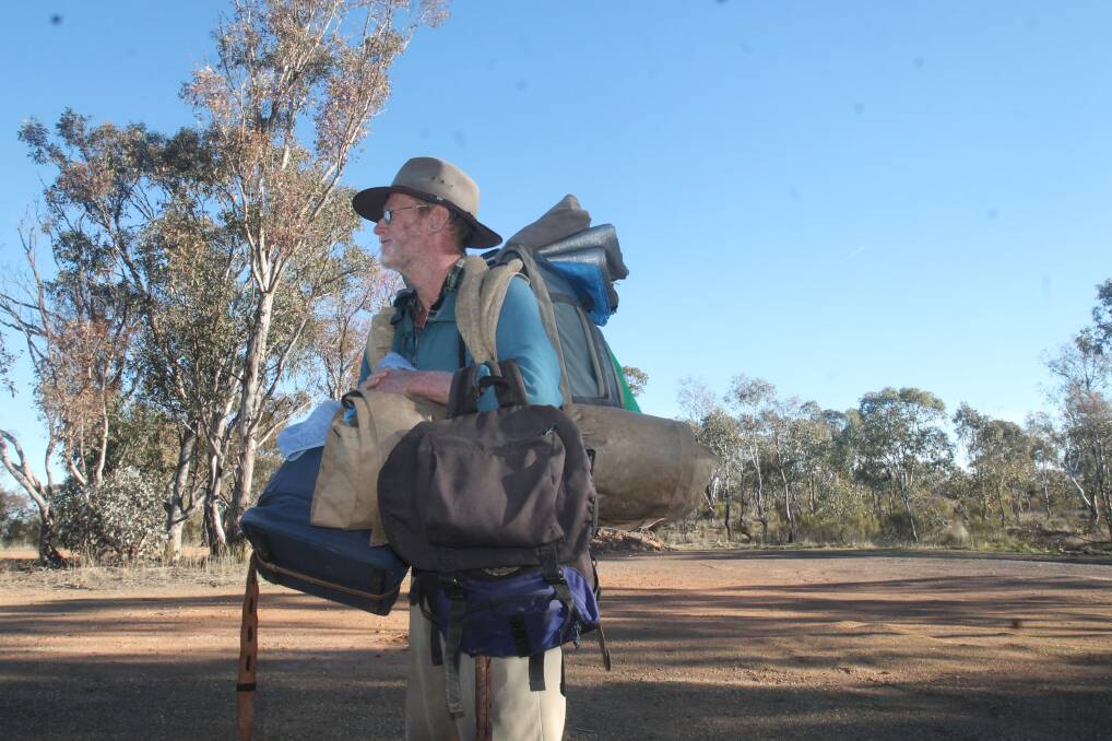 ON THE MOVE: Australia's last known swagman, Grant 'John' Cadoret, has been on the road for 40 years and has no intention of slowing down. Photo: Lachlan Grey