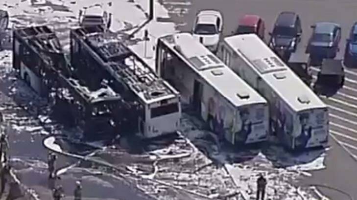 Two buses have been destroyed by fire on the perimeter of Sydney Airport. Photo: Channel Seven