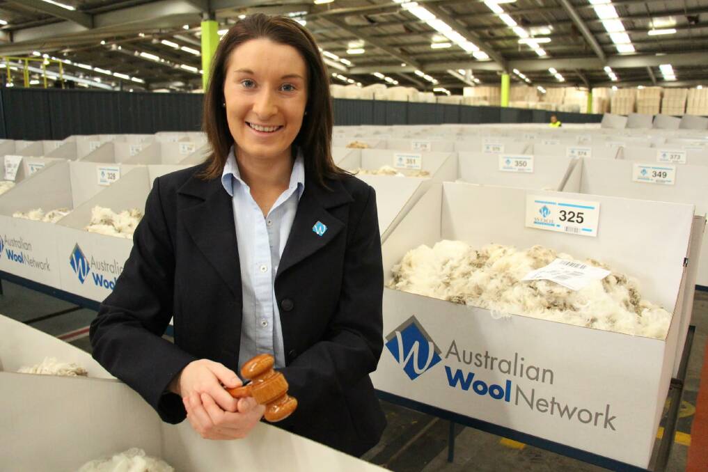 NEW VOICE: Cassie Baile is the only woman to take up the auctioneer’s gavel at the Yennora Wool Selling Centre.