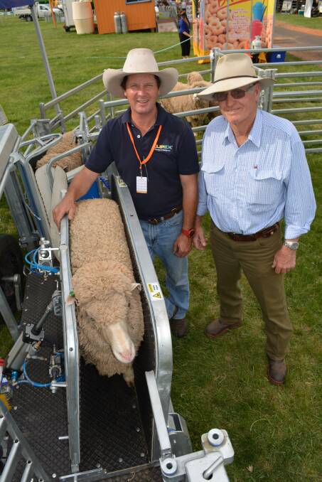 FRIENDS: Clipex Animal handling sales Manager Todd Heffernan & Stewart Reynish, “Bronkarra”, Young, at the Australian National Field Days.