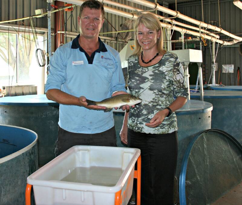 FISHY: Katrina at the Narrandera Fishery with DPI’s Matthew McLellan.