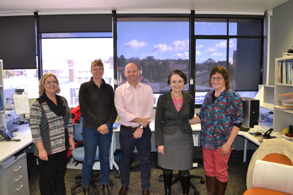 CHATTY: Anne Muir (Regional Director South East Local Land Services), Wendy Goodburn (Resource Management Officer) and Bronwen Wicks (Project Coordinator) with NSW Minister for Lands Niall Blair (centre) and Member for Goulburn Pru Goward when Mr Blair visited their offices in Goulburn last Monday.