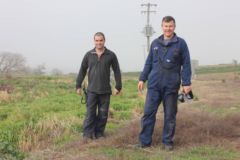 AUSTRALIAN FIRST: Southern Meats maintenance manager Scott Newton (right) and electrician Mick Sperring at the site of the new biogas processing plant in June this year which is located at the Southern Meats site in Mazamet Road, near the Hume Highway.