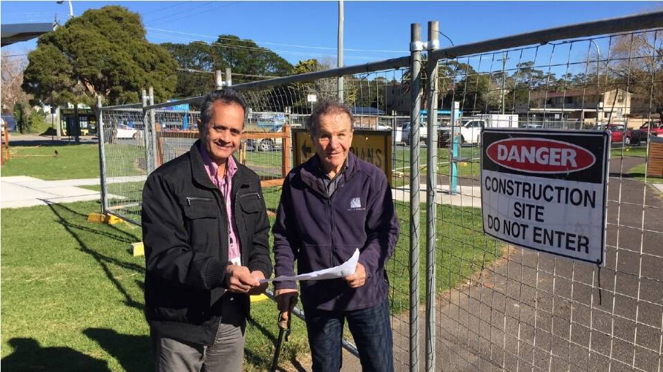 DIGGING FOR FUN: Work has started at Corrigan’s Reserve on an all-abilities playground. Eurobodalla Shire Council’s Carl Ginger and Geoff Fielding at the scene. 