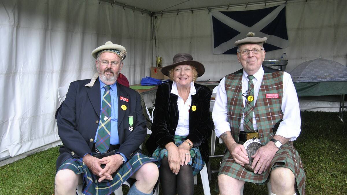 Warren Glase and Alaistair Saunders with Chieftain of the Day Valerie Cairney. Photo by Megan Drapalski