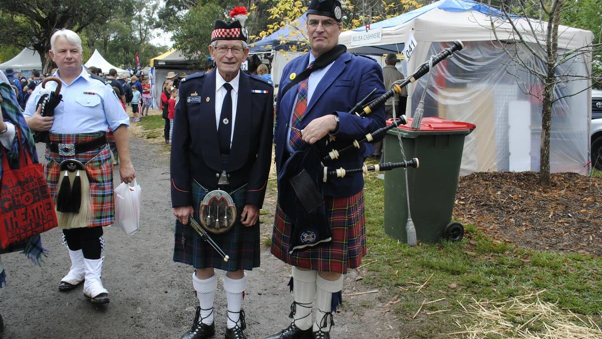 John Mitchell and Craig Cooper stand with their bagpipes and Scottish gear. Photo by Dominica Sanda