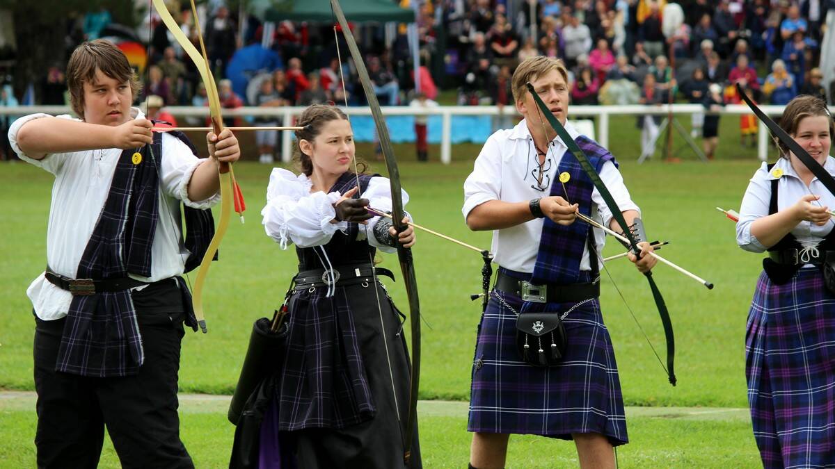 The archers prepare to fire their arrows. Photo by Jeff McGill