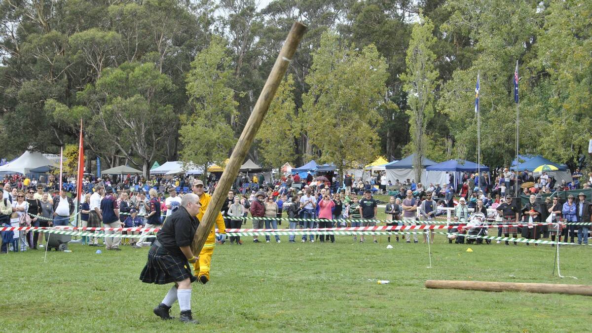 Sharon Cosh challenged Carma Burchell in the caber toss. Photo by Megan Drapalski