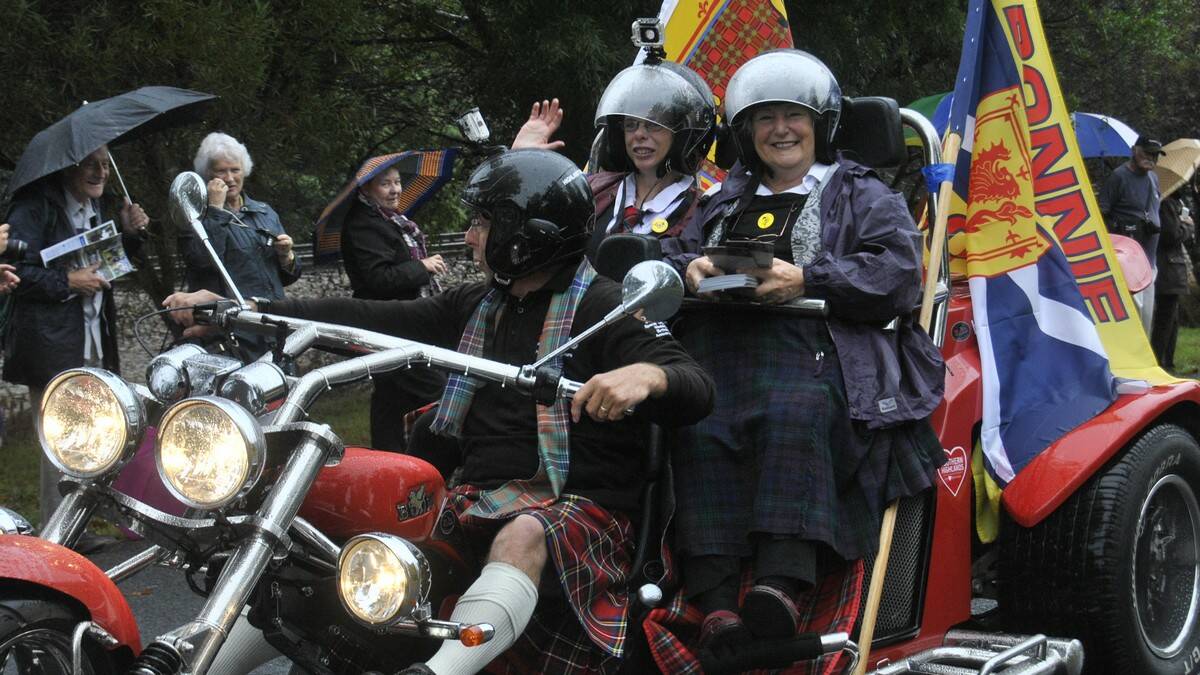 Highland Trike Tours gave two ladies a unique parade experience. Photo by Megan Drapalski