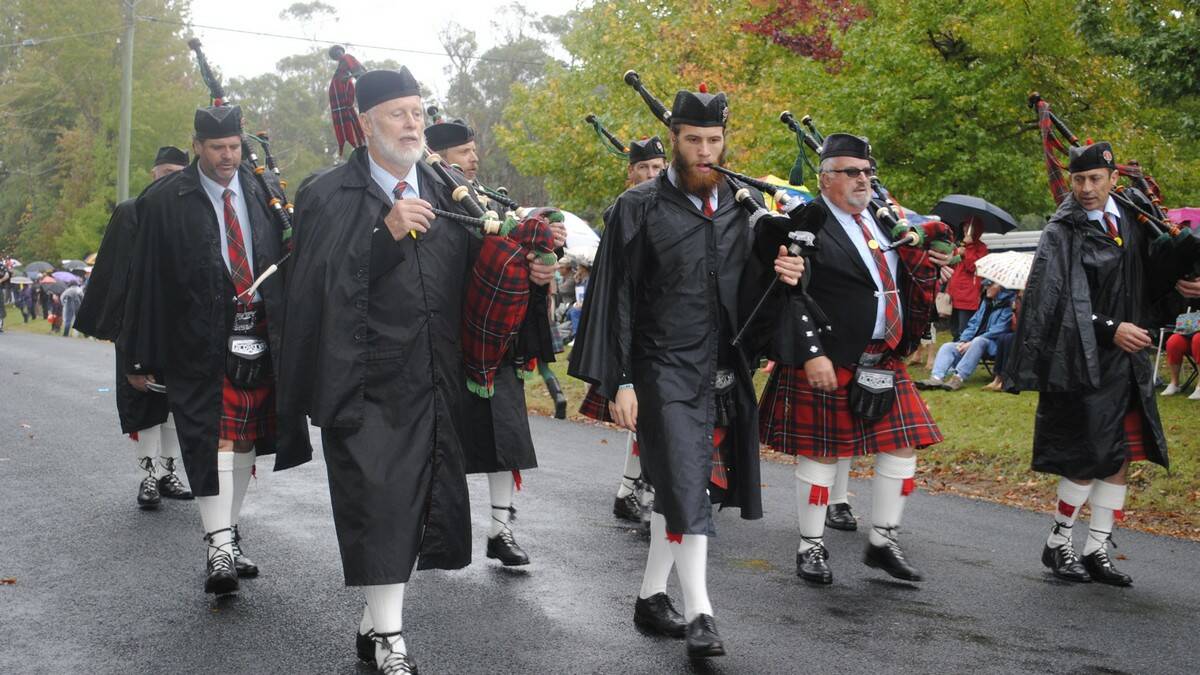 The rain didn't dampen the spirits of bagpipers. Photo by Dominica Sanda
