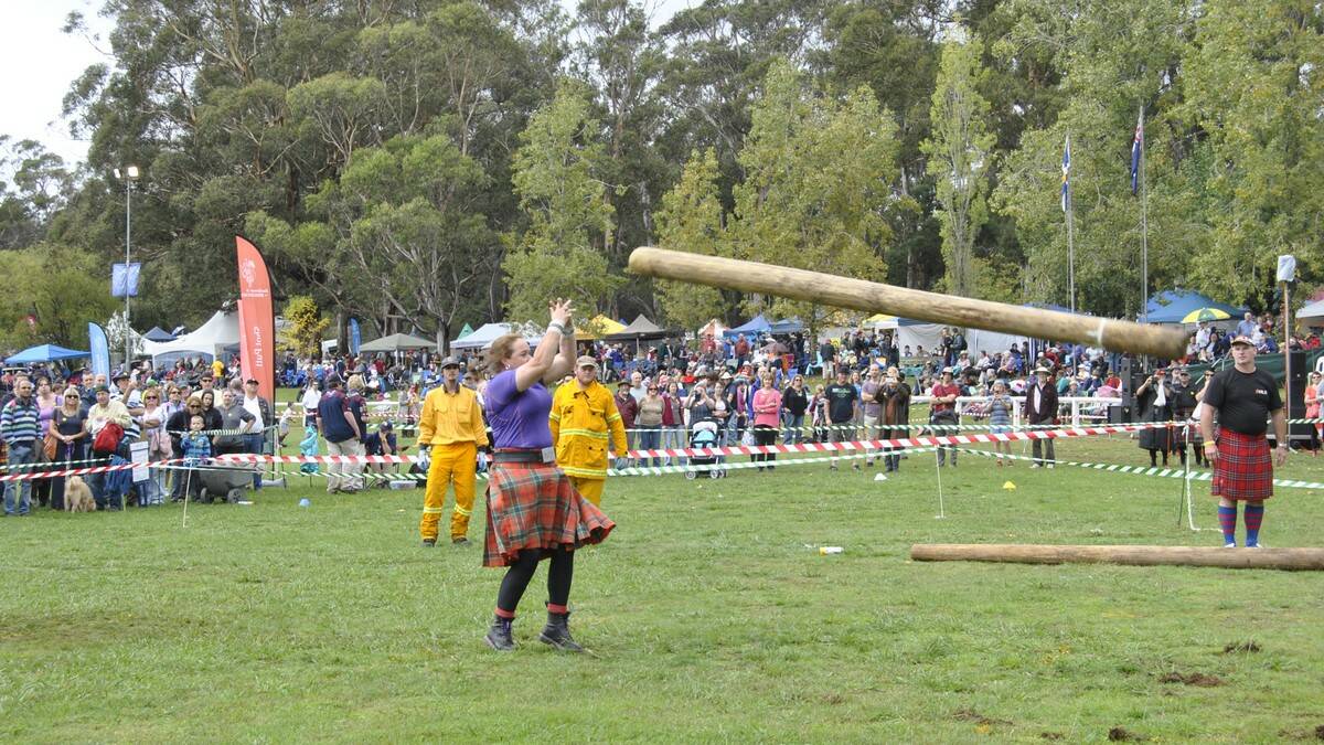 Carma Burchell was dominant in the caber toss. Photo by Megan Drapalski