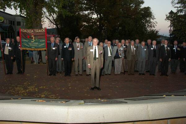 The 3rd Battalion members with Captain Bede Tongs MM in front at the Honour Roll Wall in Goulburn’s Belmore Park in 2005.  