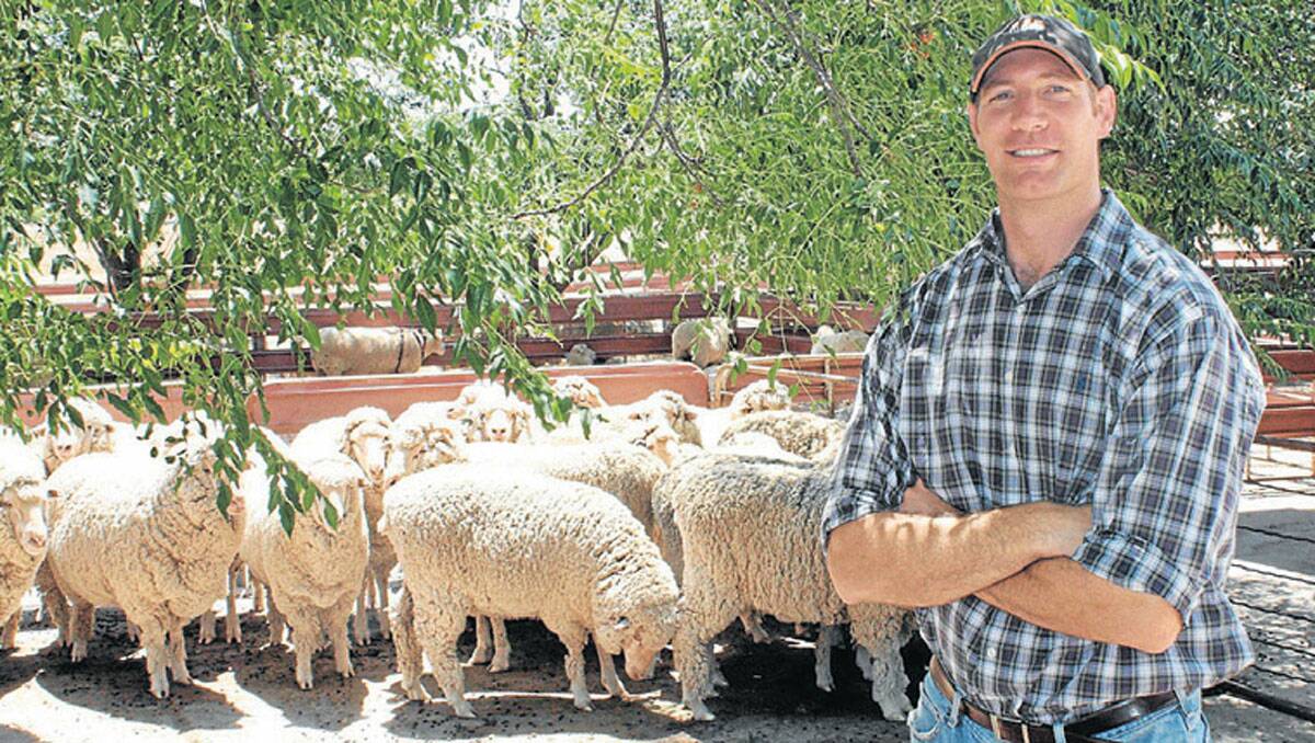 Cowra-based DPI livestock researcher, Gordon Refshauge is convinced that selecting breeding ewes by their udder condition works. Photo from DPI. 