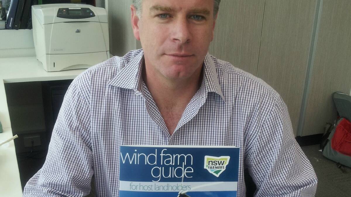 NSW Farmers CEO Matt Brand with the guide 