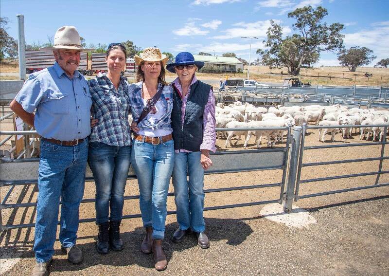 Ken White, Sonia Slattery, Kelmont Park, (buyer of 139 ewe lambs for $185 a head from the the Estate of Tony Martin) with Tony's daughter Kylie and wife Jenny, all of Yass.