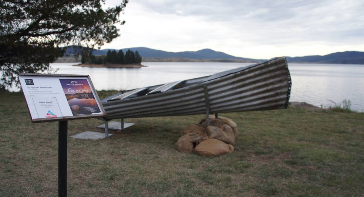 Les St Hill and the Tin Canoe displayed on the shores of Lake Jindabyne for the 2018 Jindabyne Lake Light Sculpture exhibition.  