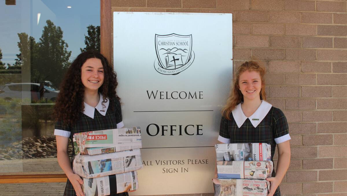 Alannah Moylan and Kaitlin Johnston with several packages that have been donated. Photo: Vera Demertzis
