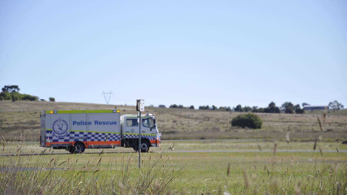 Police Rescue at the scene of Sunday's ultralight crash at Goulburn airport. Picture by Louise Thrower.