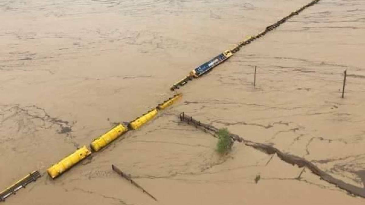 Watch a shocking timelapse of floodwater in Qld near a train derailment