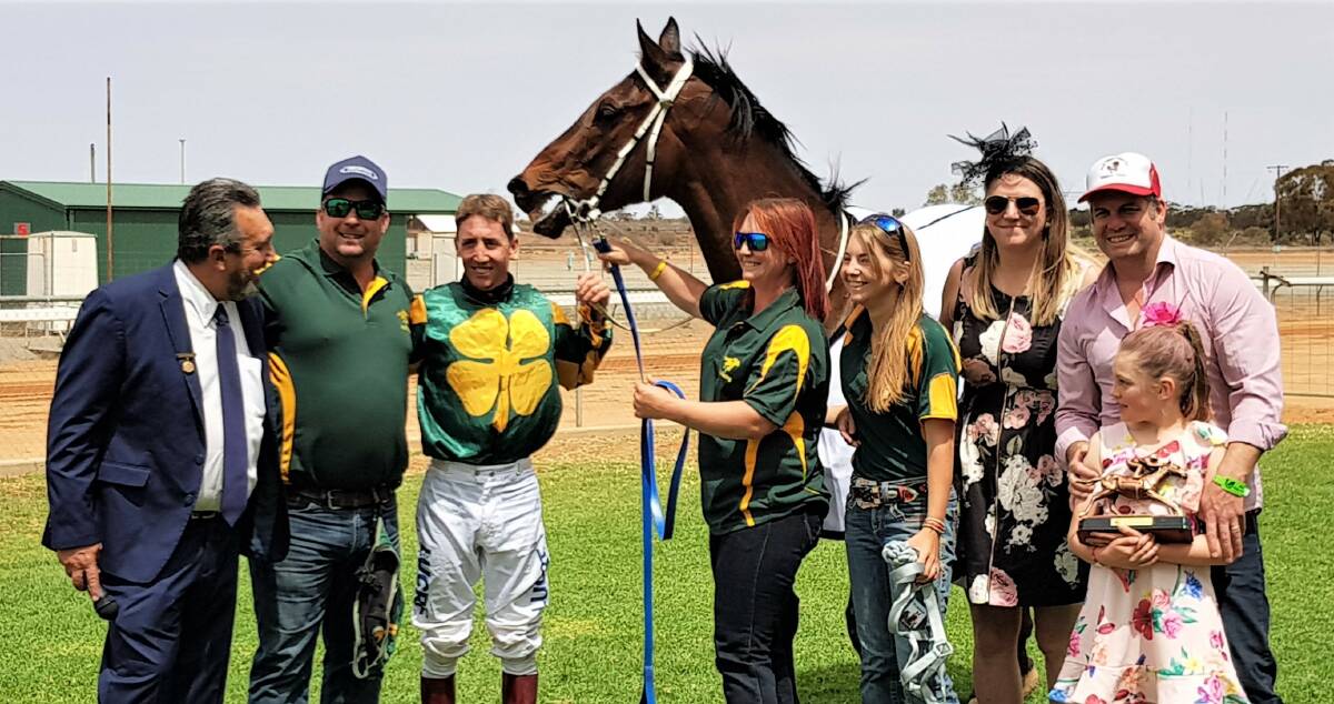 COUNTRY CONNECTIONS: Silver City Cup President Dave Gallagher, Jack Maloney, Justin Potter, Heidi Smith, Charli Smith, Crissina, Bryan and Mahli Littlely with Aussie Bob following his win at Broken Hill during the Silver City Cup.
