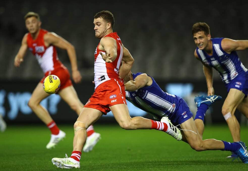 Tom Papley of the Sydney Swans kicks during last weekend's match against North Melbourne. The Swans scored just three behinds in the final term but still won the game. Photo: Robert Cianflone/Getty Images