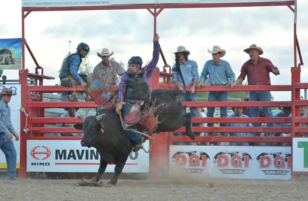 Hanging tough: While 8 seconds doesn't seem like a long time, on the back of a bull it can seem like an eternity. Photo: Penny Tamblyn.