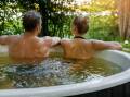 Imagine the pleasure of slipping into the warm, bubbling waters of your own backyard spa after a long day, the stresses of life melting away. Picture Shutterstock