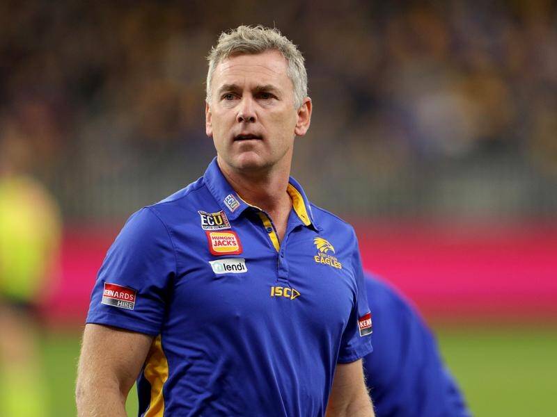 Eagles coach Adam Simpson (pic) won't be staking out the Kangaroos job, Josh Kennedy says.
