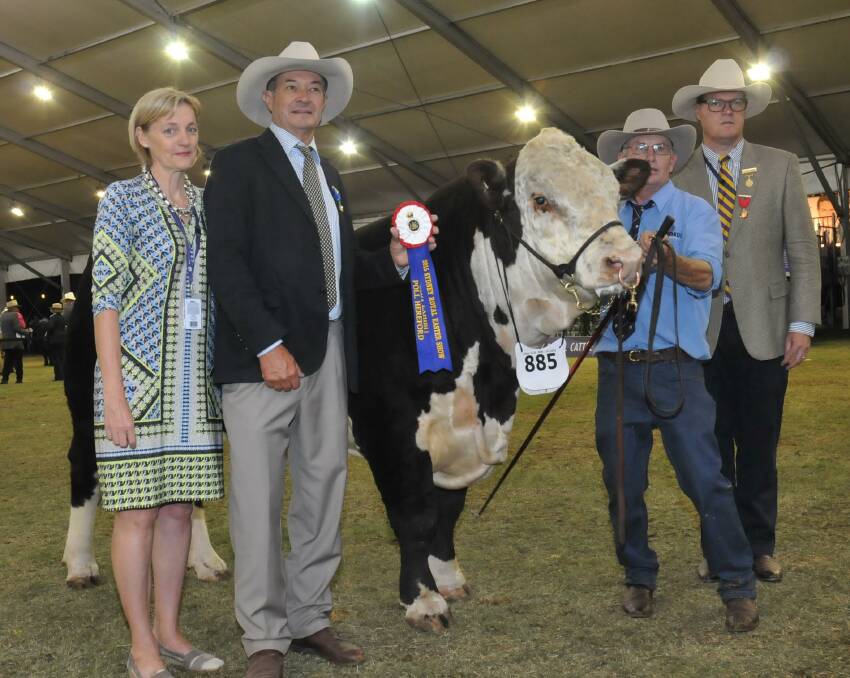 SUPREME: The Supreme champion Poll Hereford at the 2015 Sydney Royal with judge David Bondfield, Dalveen, Qld, his wife Prue, exhibitor Steve Crowley, Barraba, NSW, and Stuart Davis, NSW RAS Cattle Committee member. (Photo Wayne Jenkins)