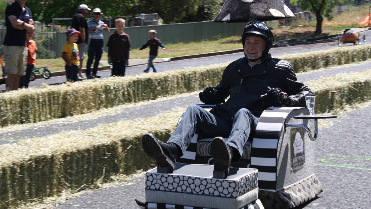Roger Buckman in his very stylish and comfy-looking billy cart!