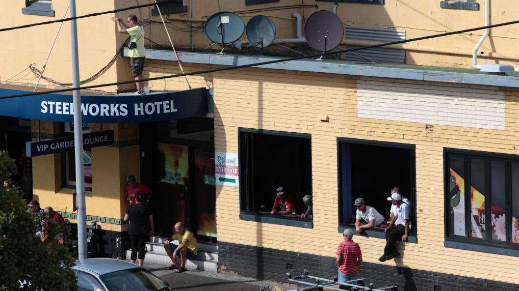 Thriving hub: In 2014, the "Top Pub" was a key vantage point as the Port Kembla stack came down. 